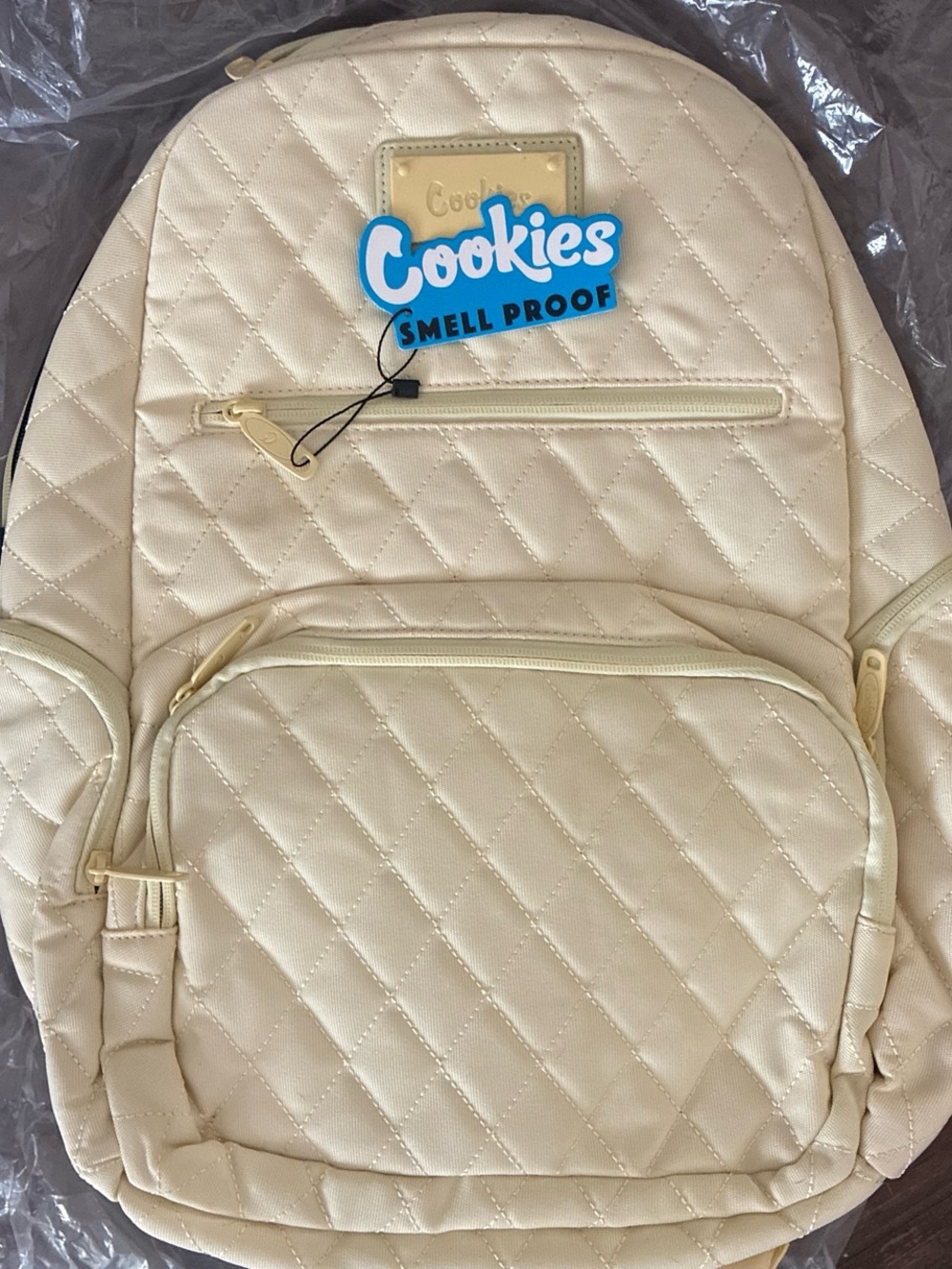 Cookies Smell Proof Quilted Backpack - Cream. Brand new with tags
